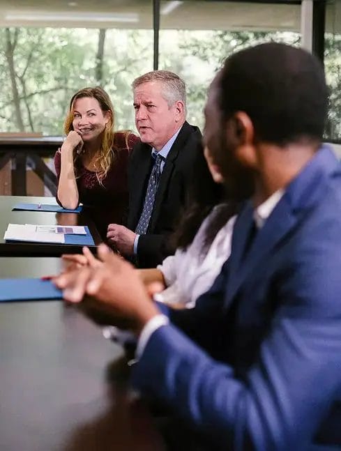 Business meeting discussion in conference room