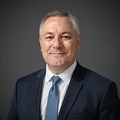 Smiling businessman in suit and tie portrait